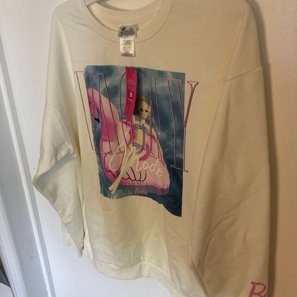 White Barbie sweatshirt in size XL. Has picture of Barbie on a flamingo.1 left - Picture 1 of 4